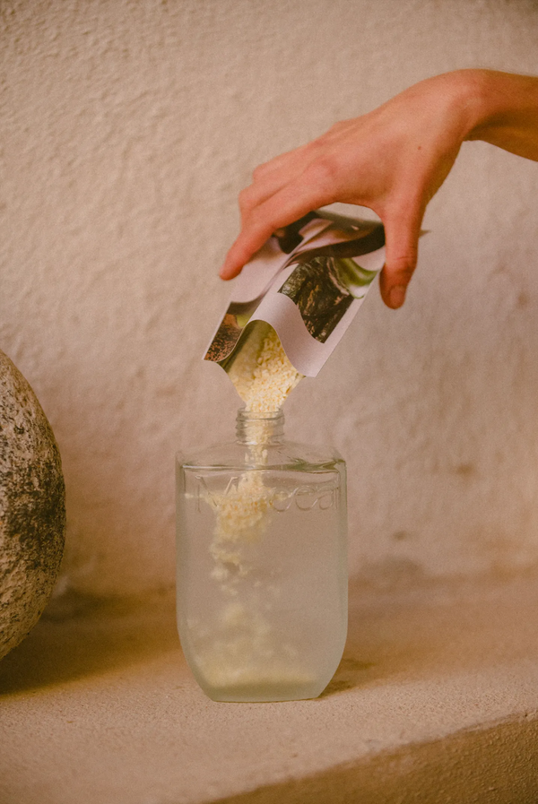 Pour the concentrate crystals from the sachet.